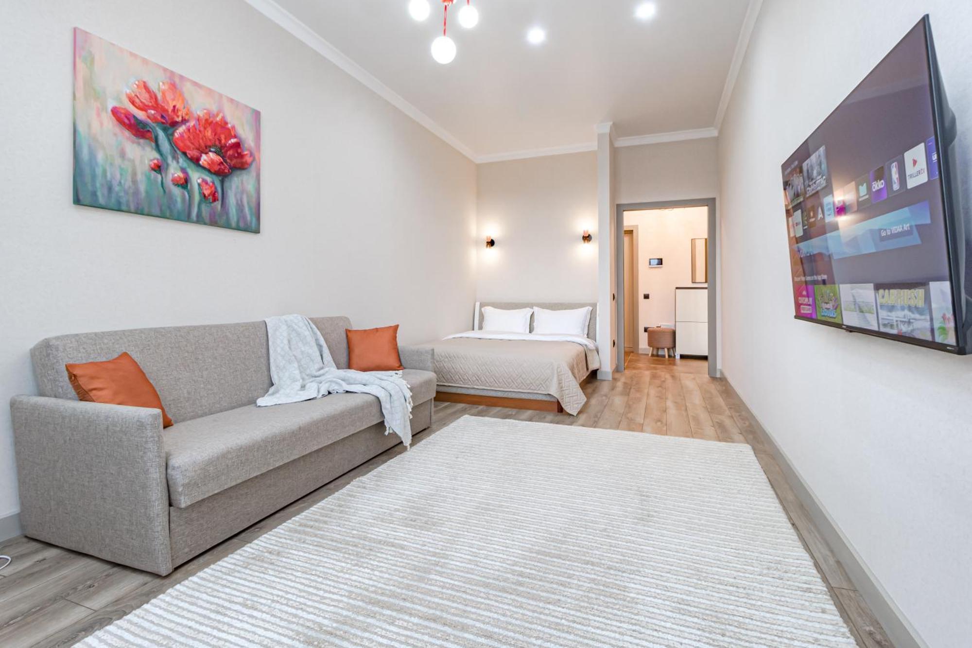 уютная, красивая с дизайнерским ремонтом, р-н Eхро, арена, назарбаев Apartment *